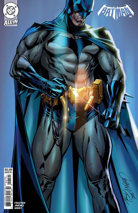 Comic book cover featuring a superhero in a blue and gray costume with a glowing emblem.